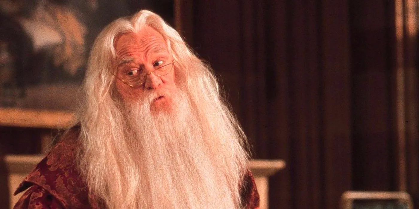 Richard Harris as Dumbledore Looking at Harry in the Hospital Wing in Harry Potter and the Philosopher's Stone Image