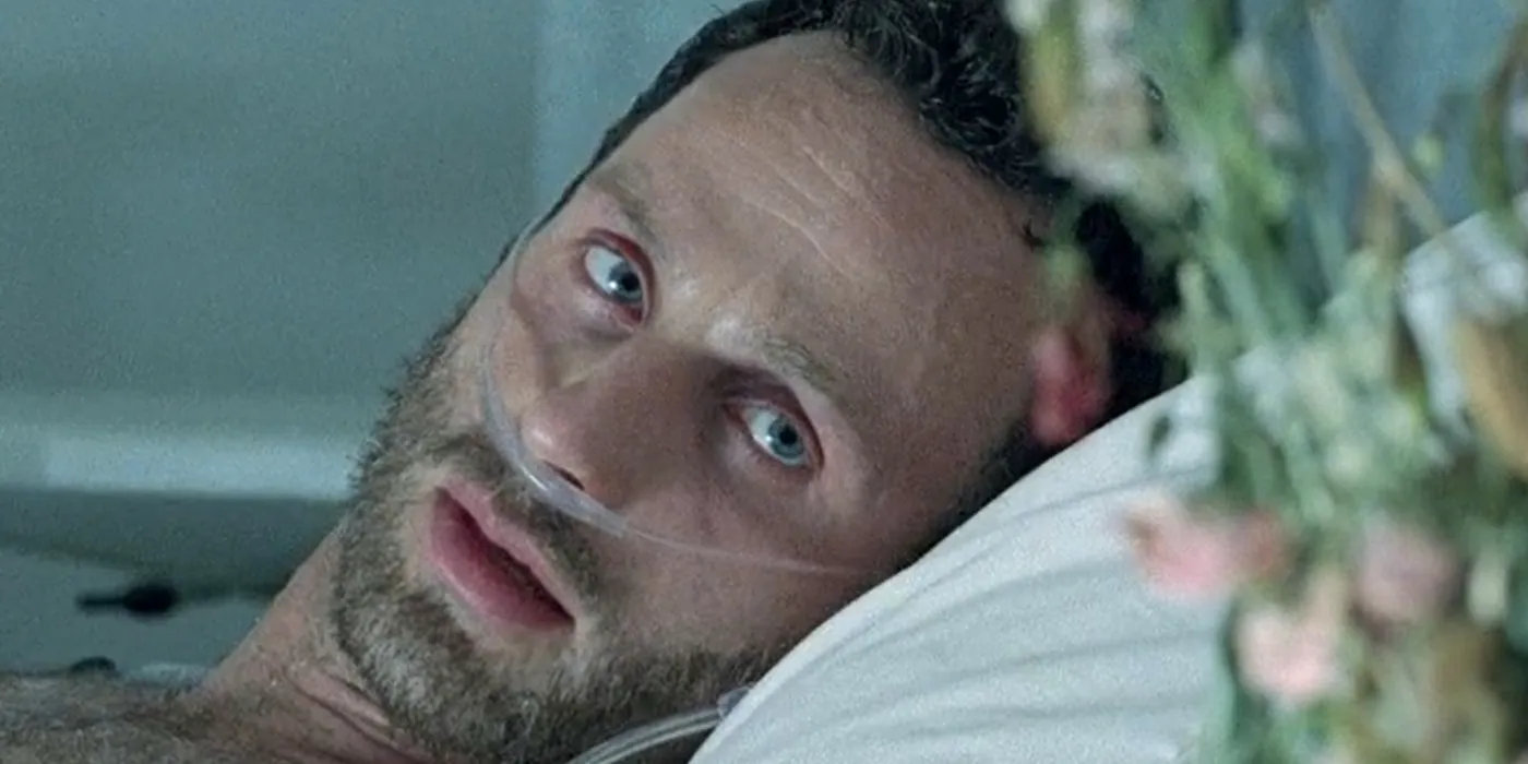 Rick Grimes looking at flowers on The Walking Dead Image