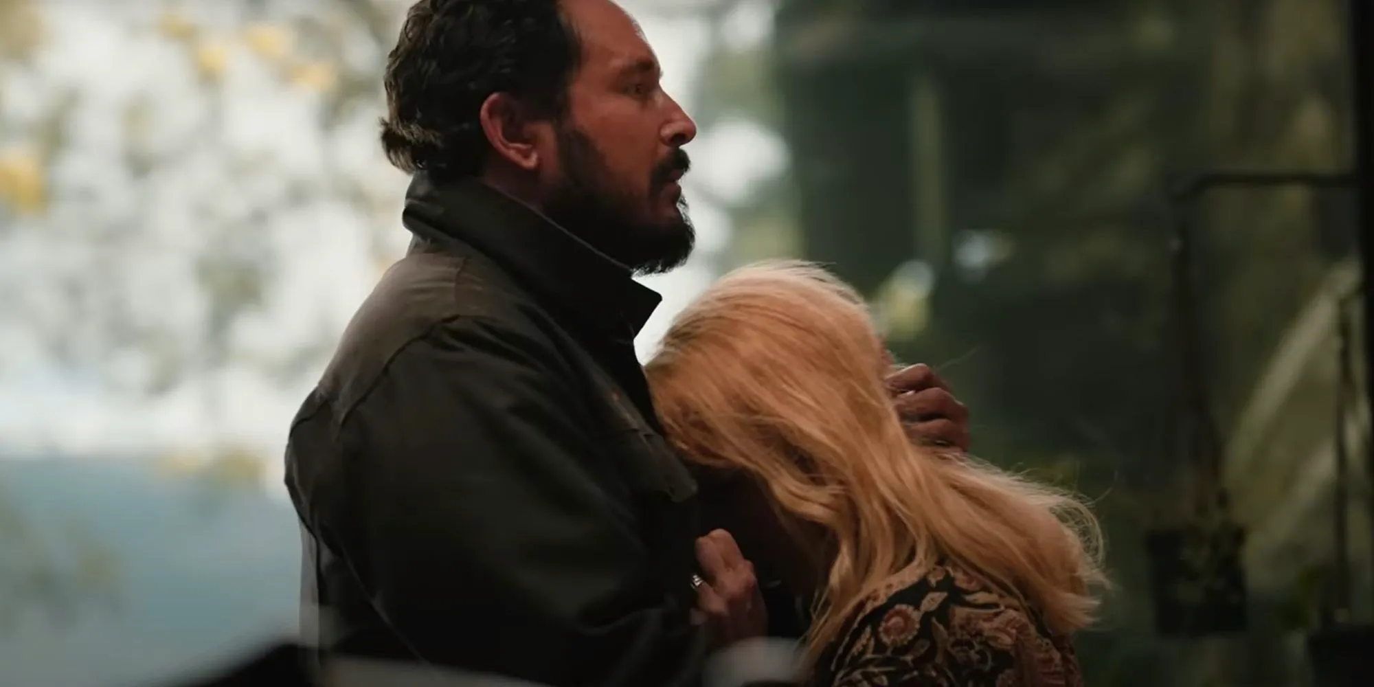 Rip Wheeler holding Beth Dutton in the Yellowstone season 5 trailer Image