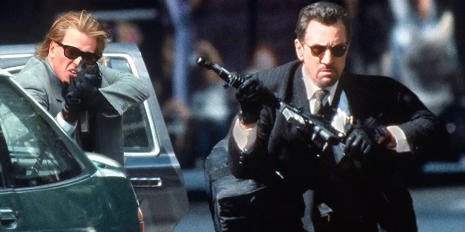 Robert De Niro and Val Kilmer with assault rifles in Heat Image