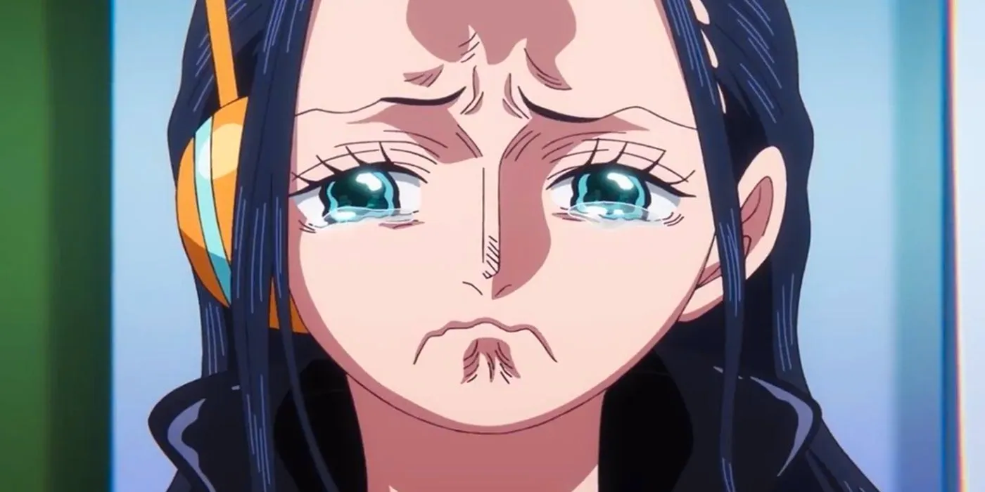 Robin crying with one ear piece in on One Piece's Egghead Island. Image