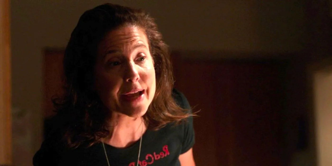 Robin Weigert as Teddi Bruin talking someone offscreen in Tracker season 1, episode 1. Image