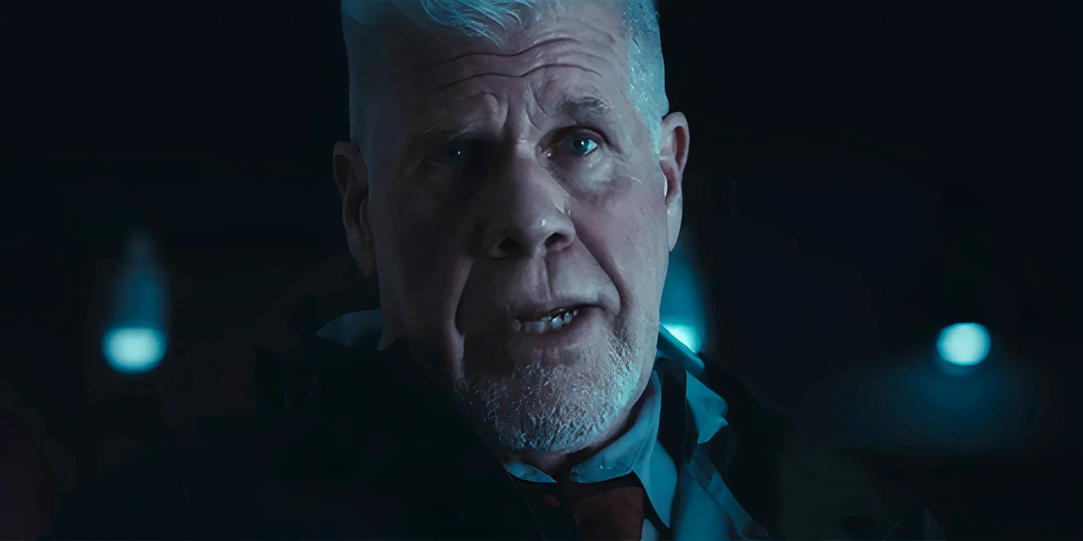 Ron Perlman as Zephyr looking worried and talking to someone in Succubus Image