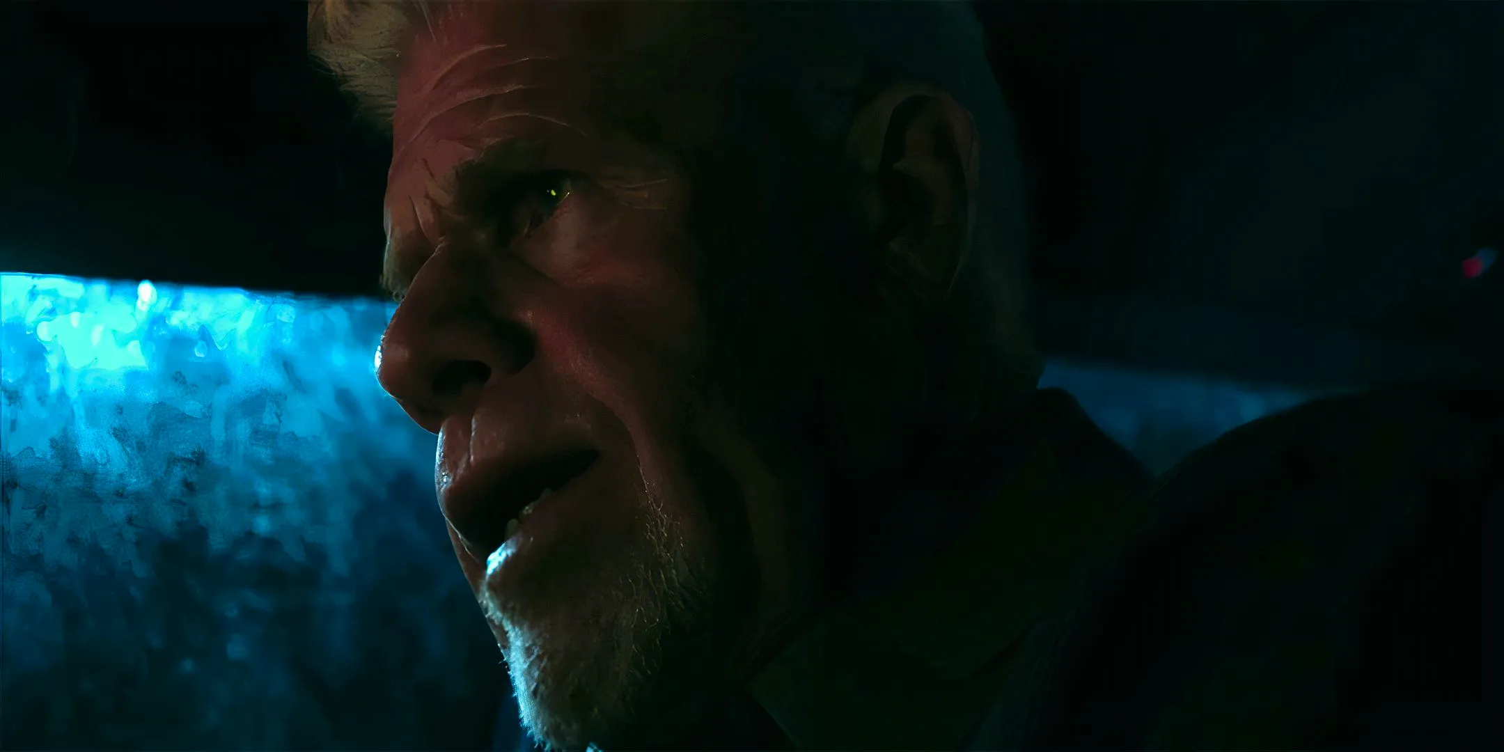 Ron Perlman as Zephyr looking worried in his car in Succubus Image