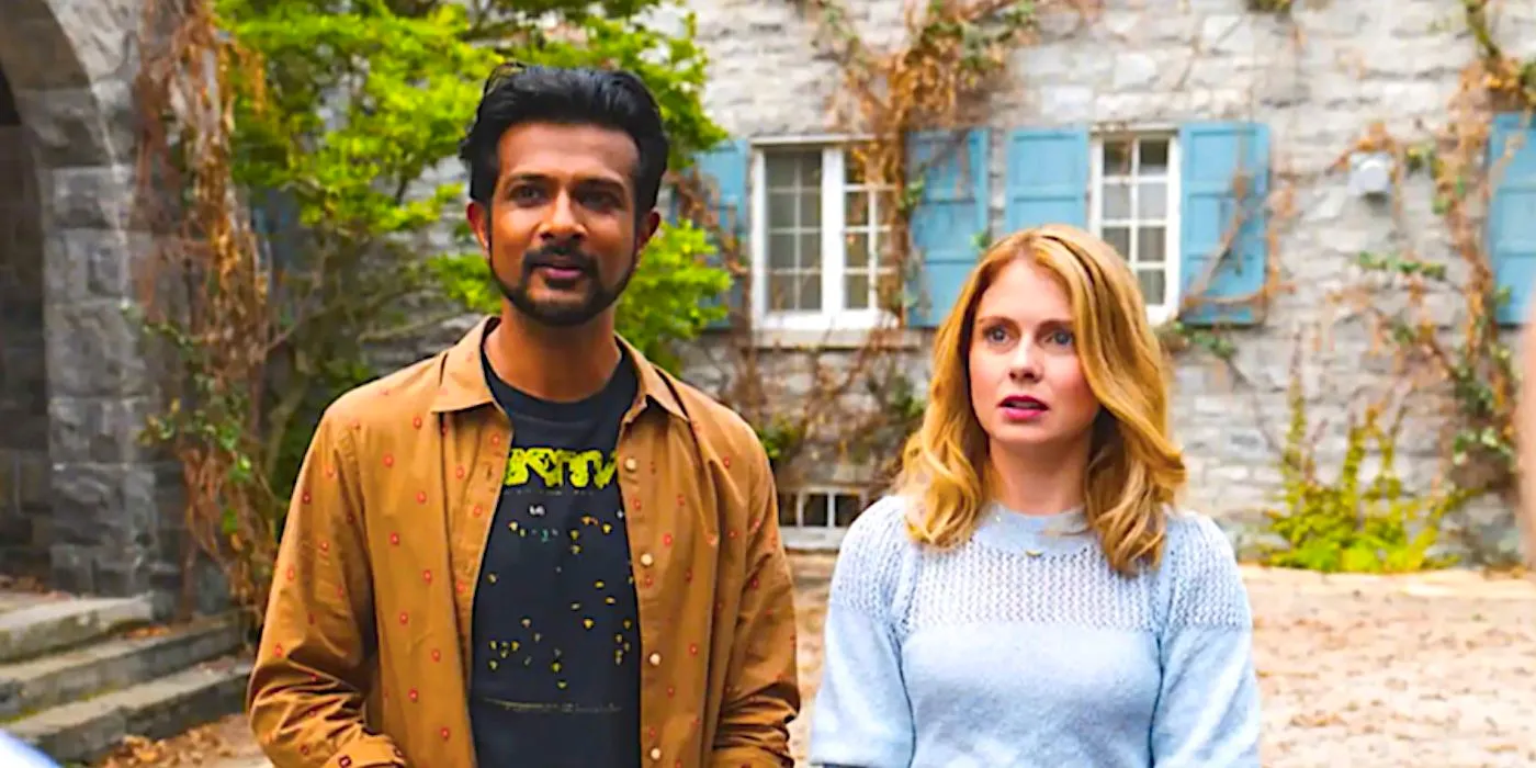 Rose McIver's Sam and Utkarsh Ambudkar's Jay standing looking worried in a courtyard from Ghosts Image