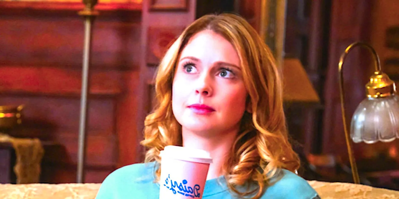 Rose McIver's Sam holds up a coffee cup in Ghosts Image