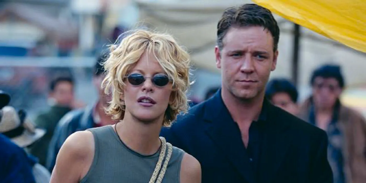 Russell Crowe and Meg Ryan walk through a market in Proof of Life Image