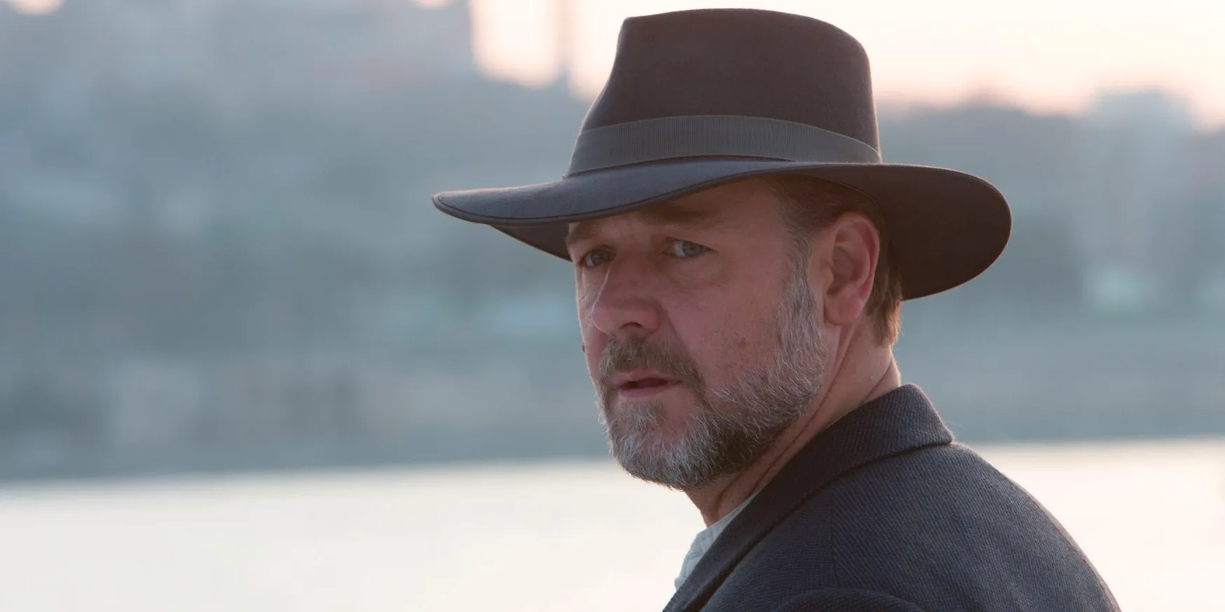 Russell Crowe in The Water Diviner wearing a hat and turned to the side Image