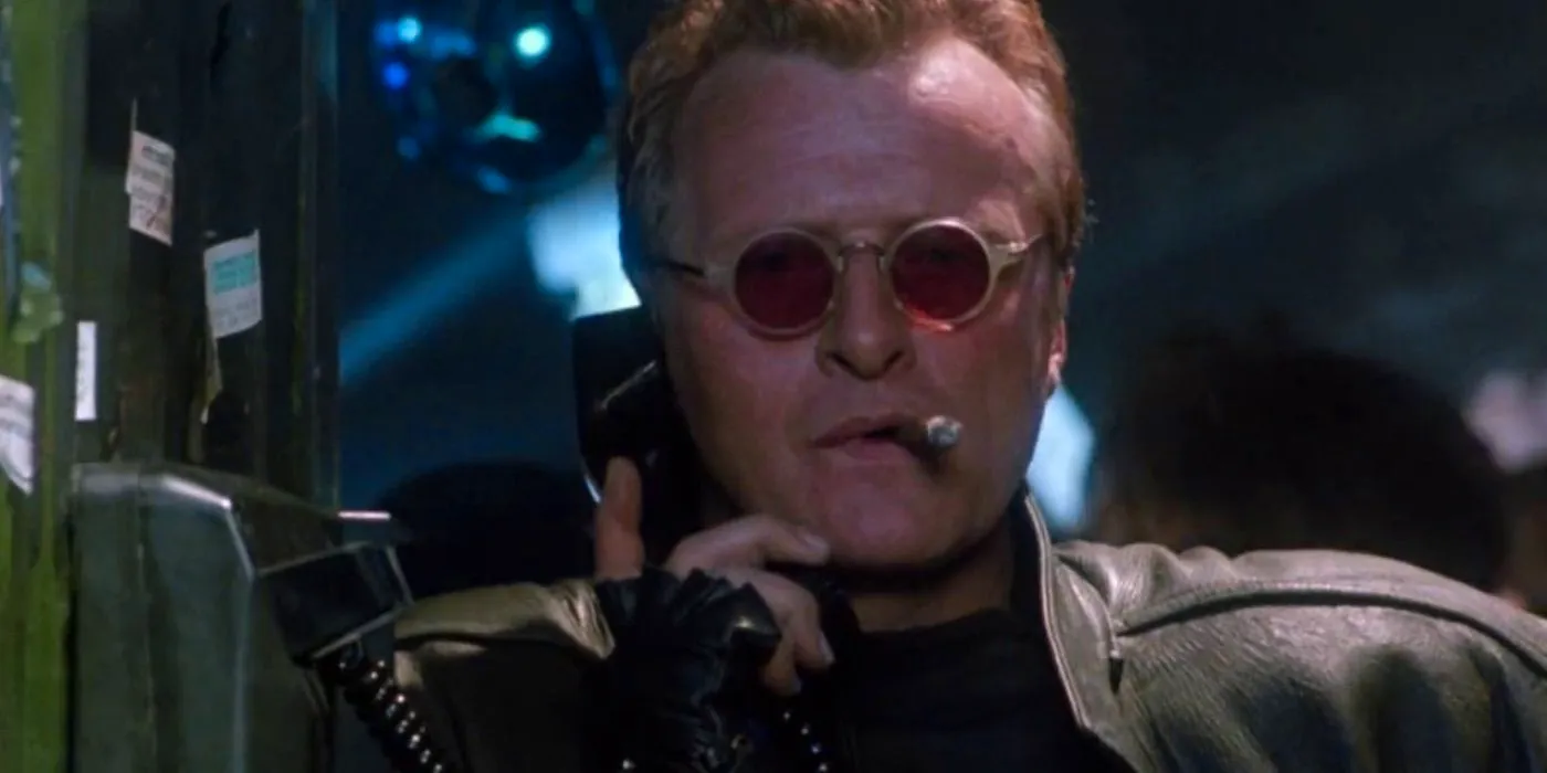 Rutger Hauer smokes while talking on the phone in Split Second Image