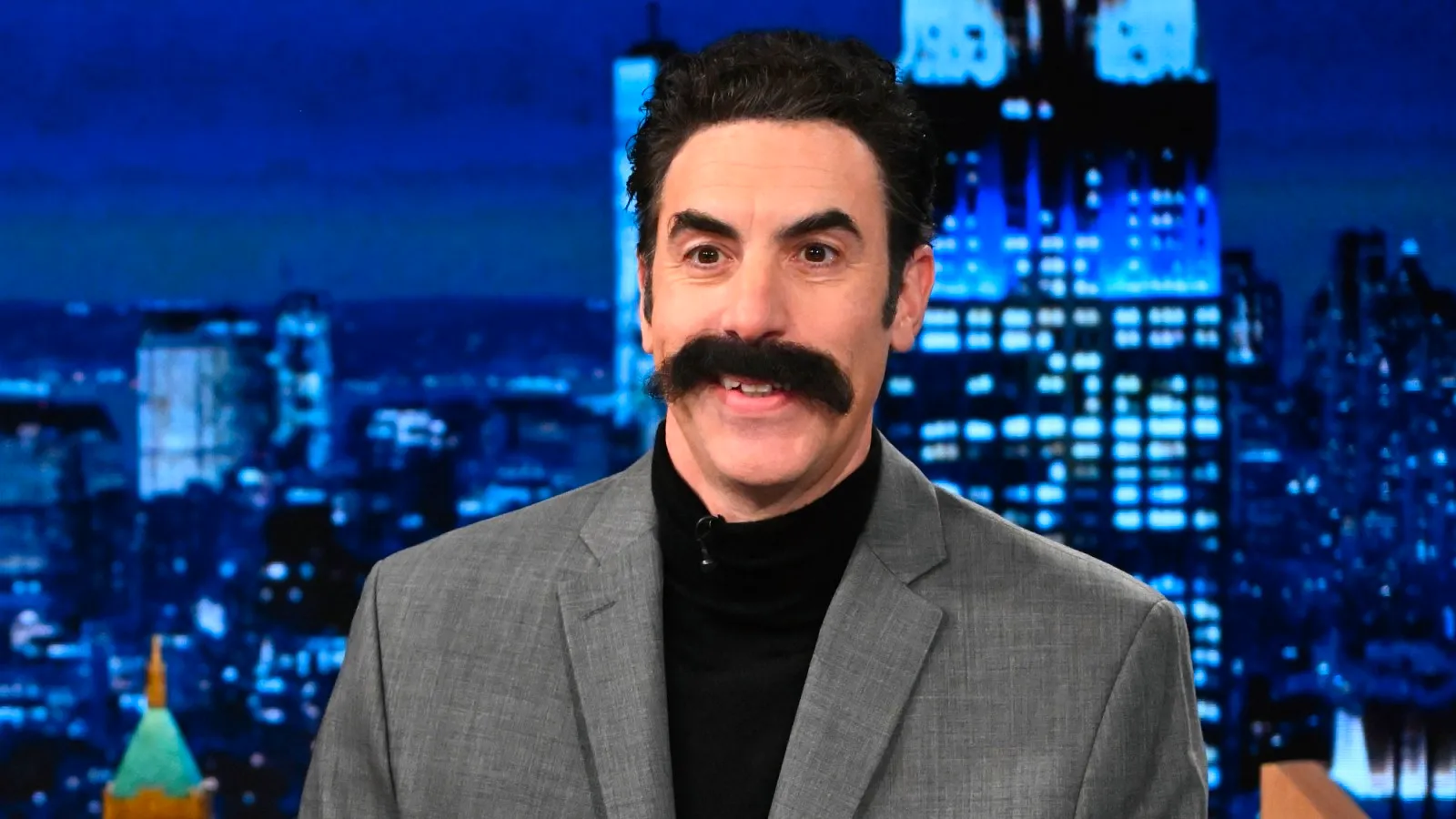 Sacha Baron Cohen Pretends to Moderate Presidential Debate as Borat Image