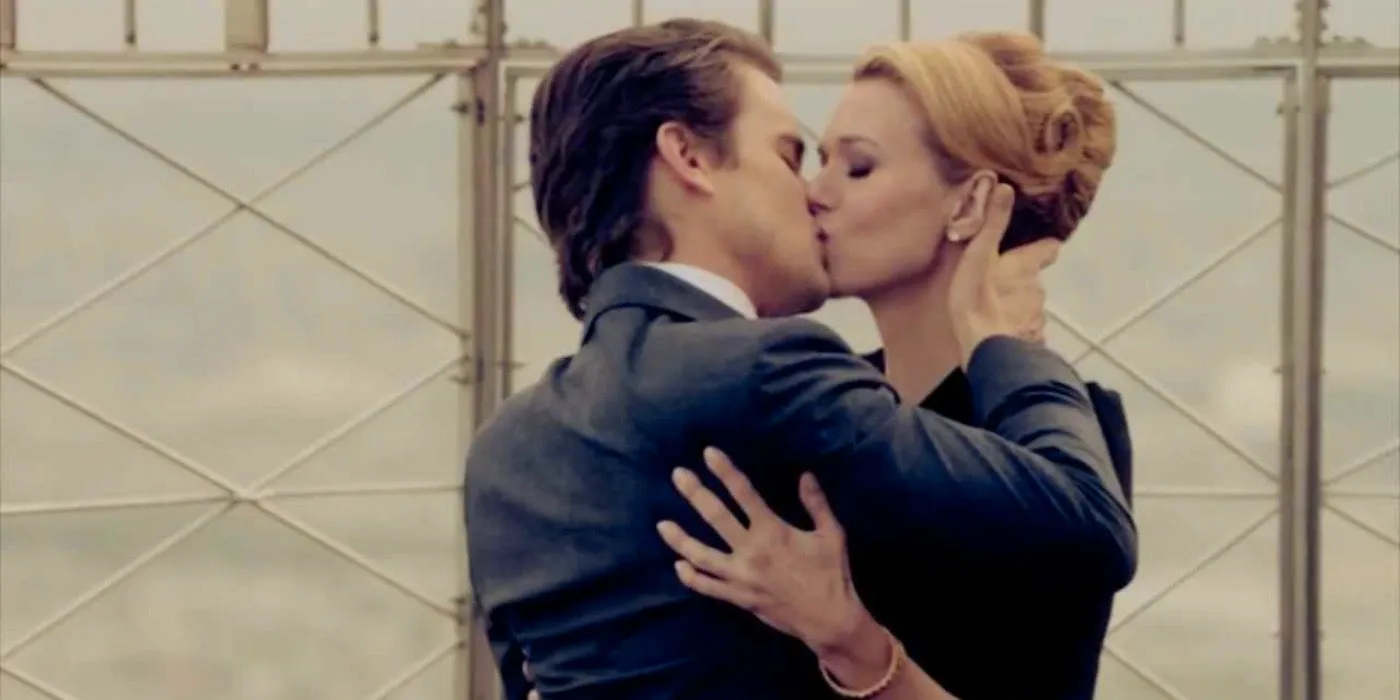 Sara and Neal kissing on 'White Collar'. Image