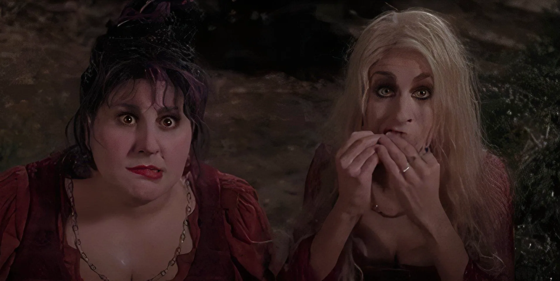 Sarah eating a spider next to Mary in Hocus Pocus Image