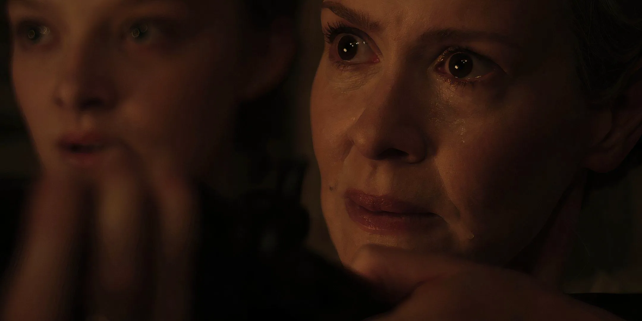 Sarah Paulson as Margaret with a tear in her eye and aiming a shotgun in Hold Your Breath Image