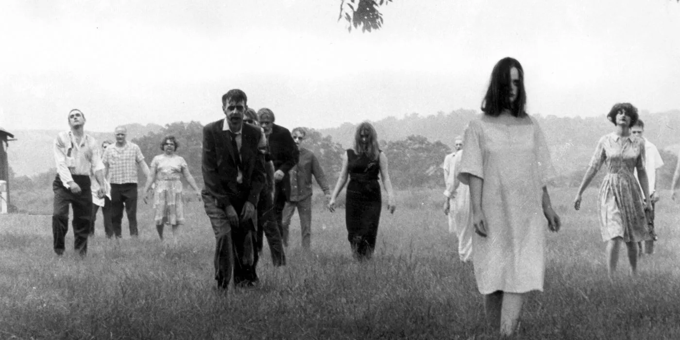 Screencap of zombies walking in a field from Night of the Living Dead. Image