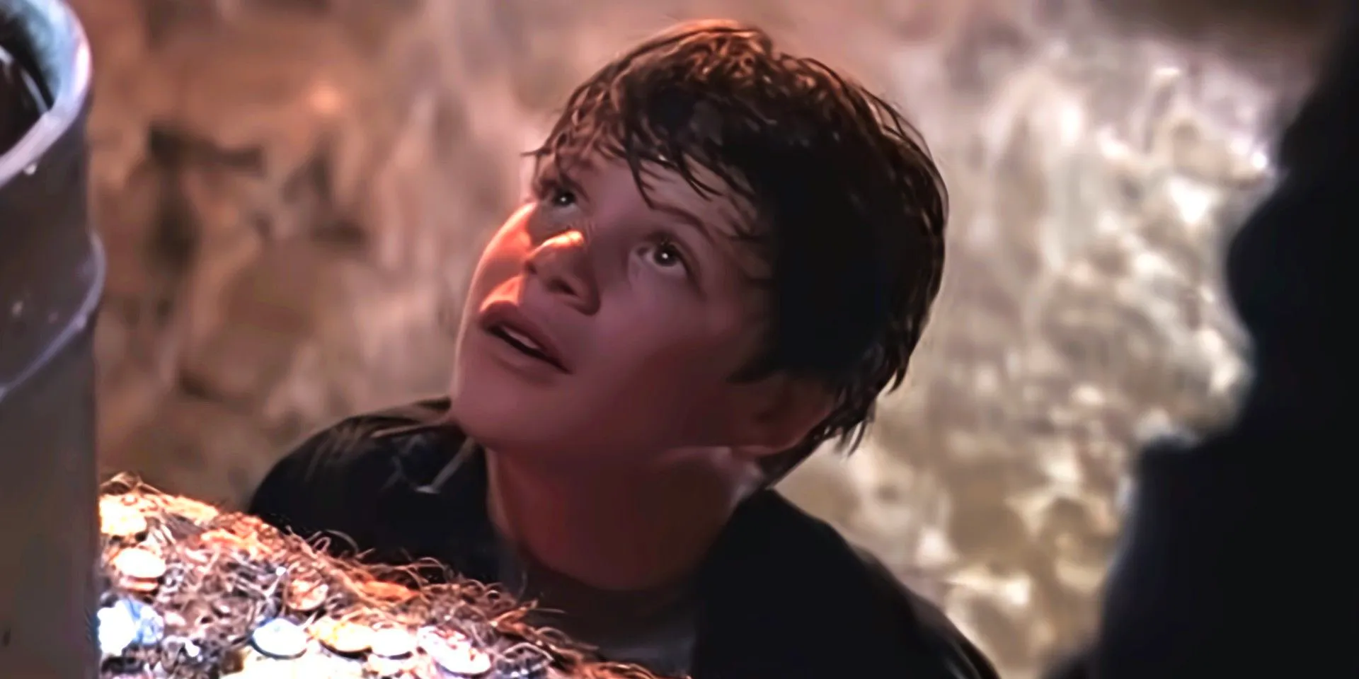 Sean Astin as Mikey down the well in The Goonies Image