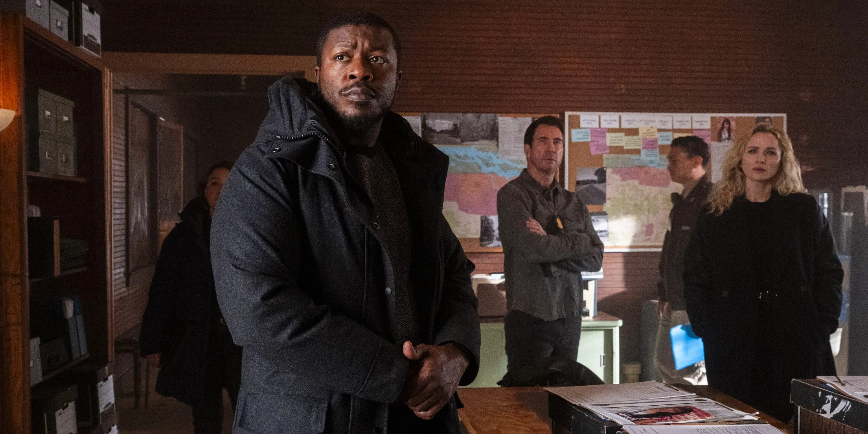 Shantel VanSanten as Special Agent Nina Chase, Dylan McDermott as Supervisory Special Agent Remy Scott, and Edwin Hodge as Special Agent Ray Cannon look on in the situation room in FBI: Most Wanted. Image