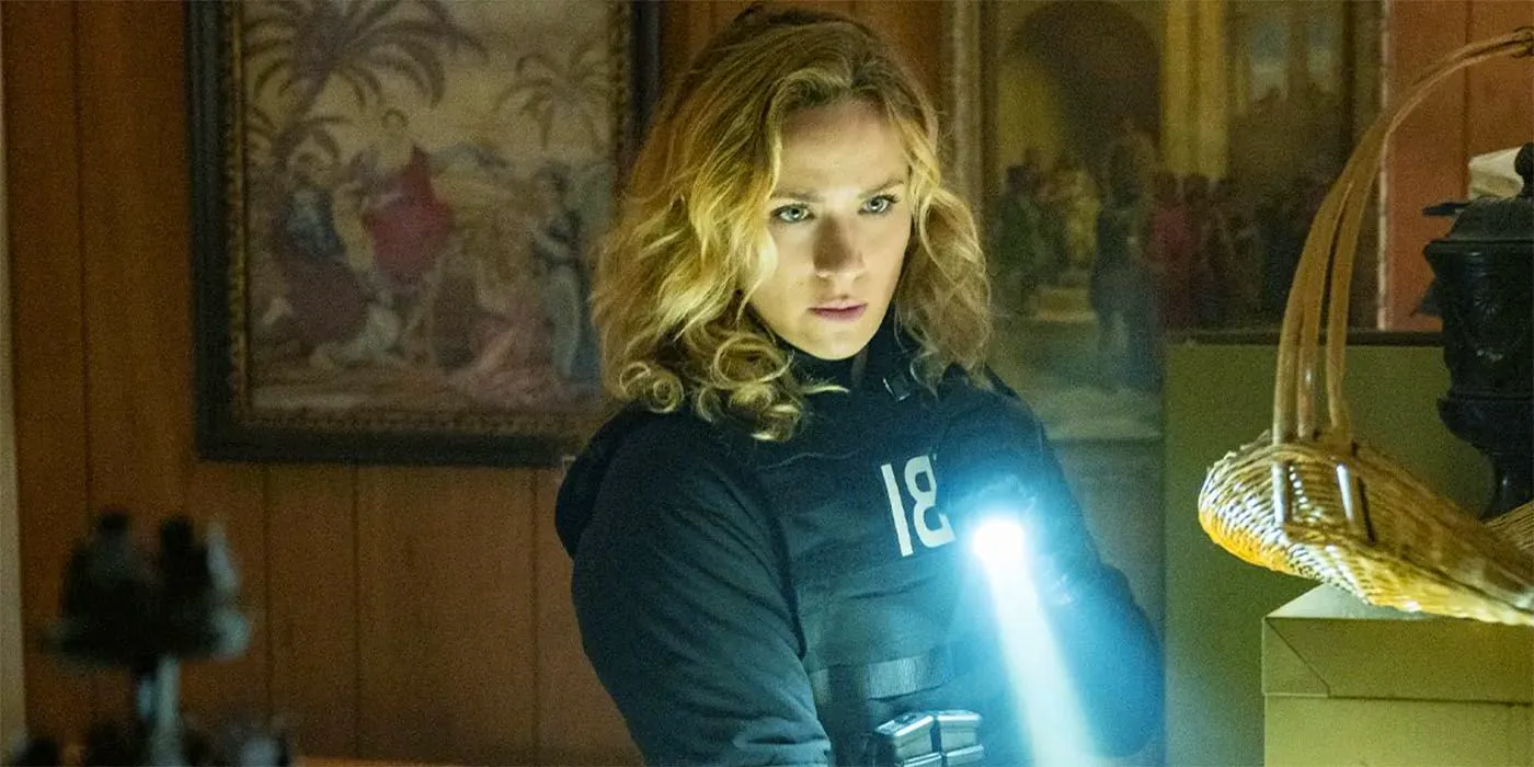 Shantel VanSanten looking focused as Special Agent Nina Chase in FBI Image