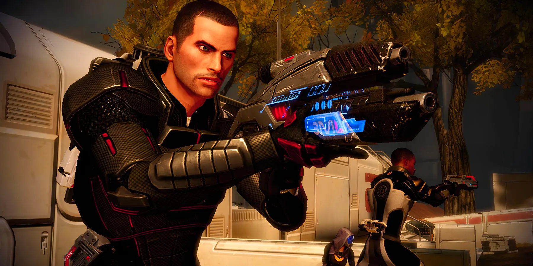 shepard-with-a-gun-in-mass-effect-2.jpg Image