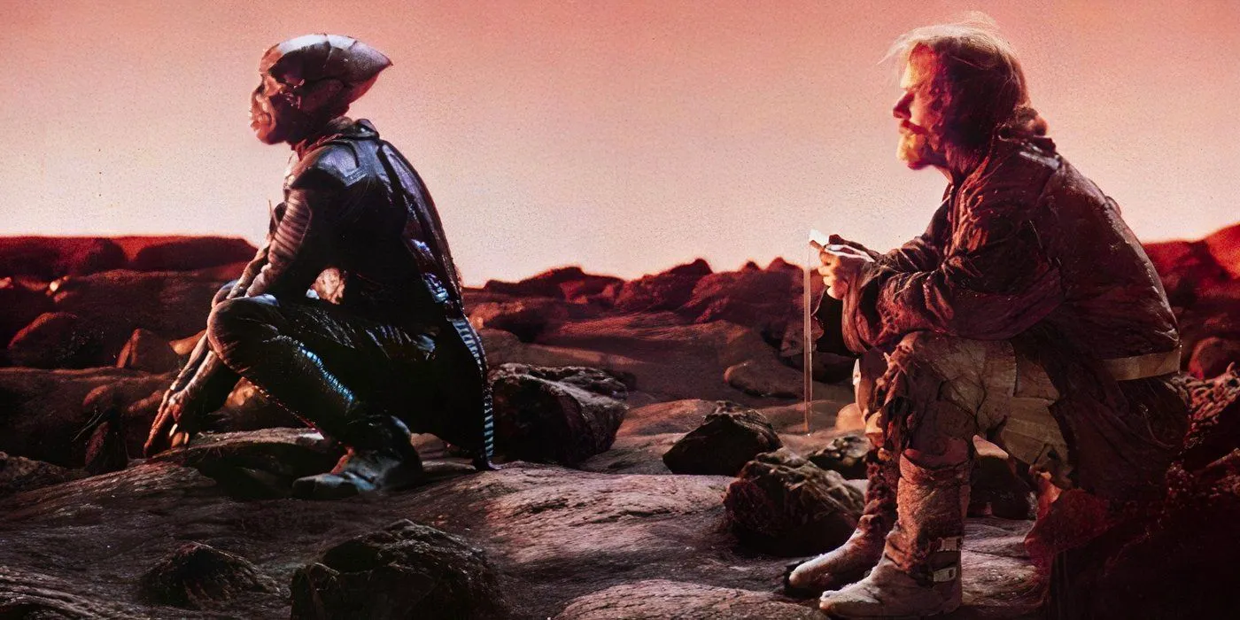 Shigan and Willis watch the sunrise in Enemy Mine Image