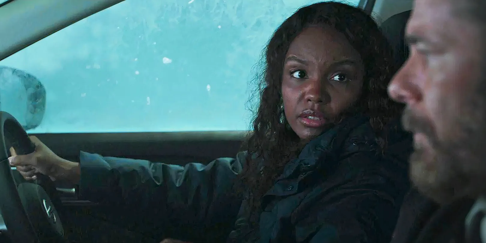 Sierra McClain as Grace driving in a blizzard in 9-1-1: Lone Star. Image