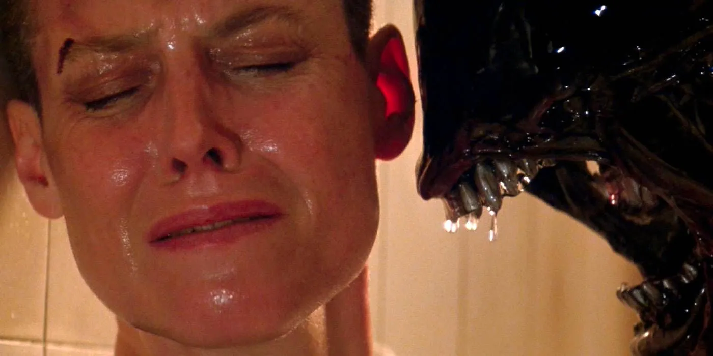 Sigourney Weaver as Ellen Ripley winces as the alien looms close to her face in Alien 3 Image