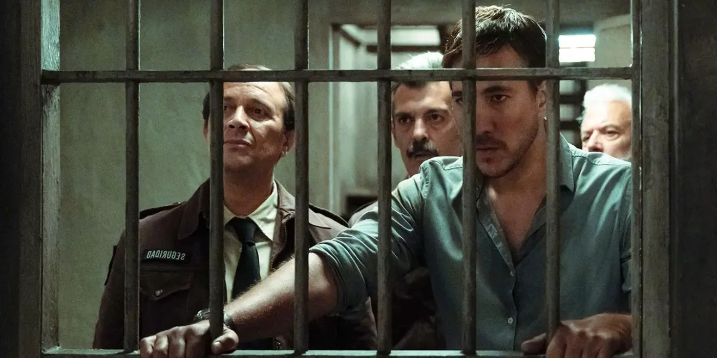 Simon Lago (Luis Callejo) and other prisoners behind bars in The Longest Night. Image