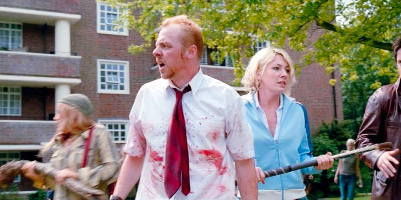 Simon Pegg as Shaun and Kate Ashfield as Liz looking bewildered as they're surrounded by zombies in Shaun of the Dead in Shaun of the Dead. Image