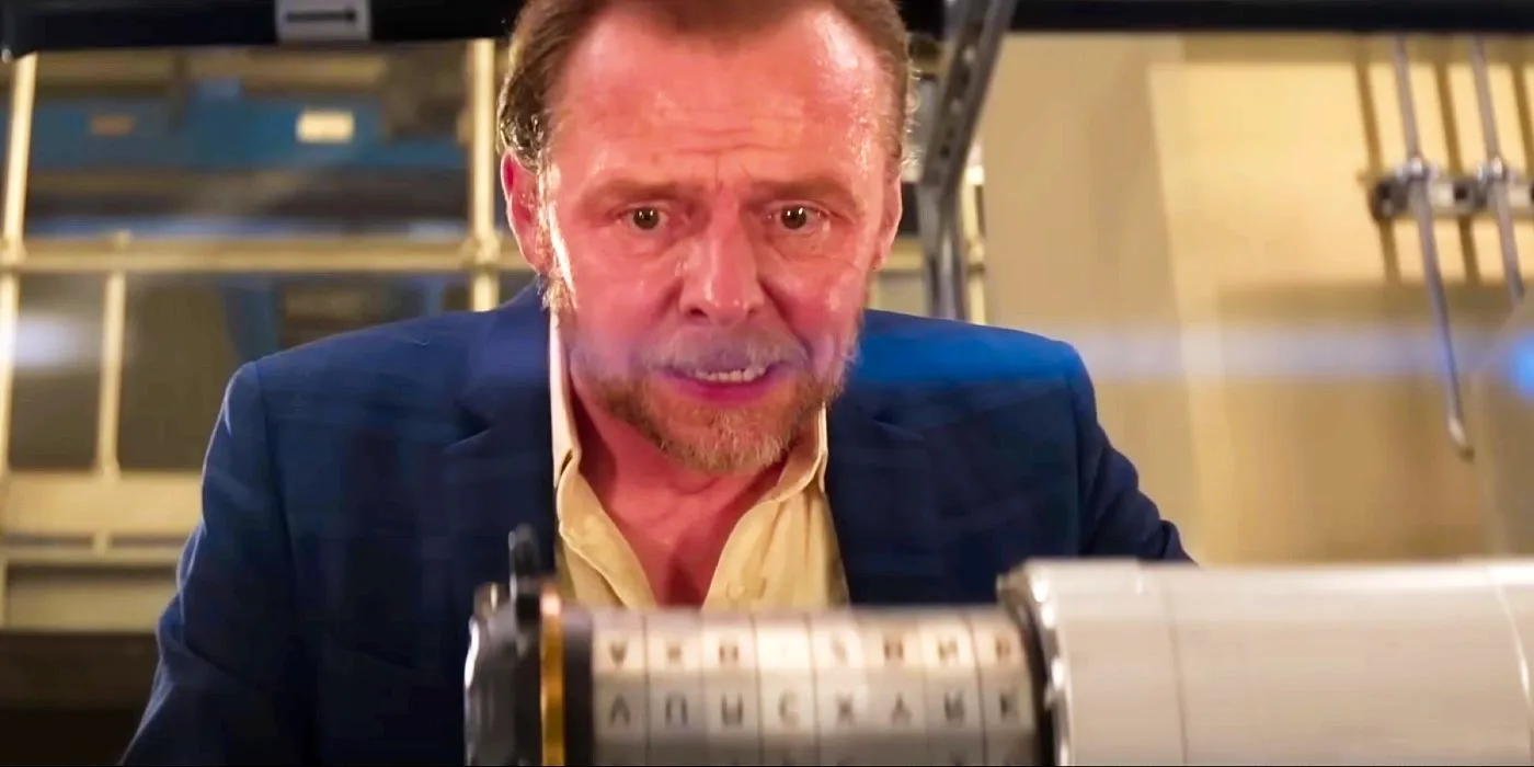 Simon Pegg looking at a cipher on a nuclear bomb in Mission: Impossible – Dead Reckoning Part One. Image