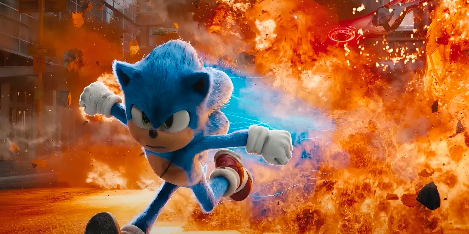 Sonic running in front of an explosion in Sonic the Hedgehog Image