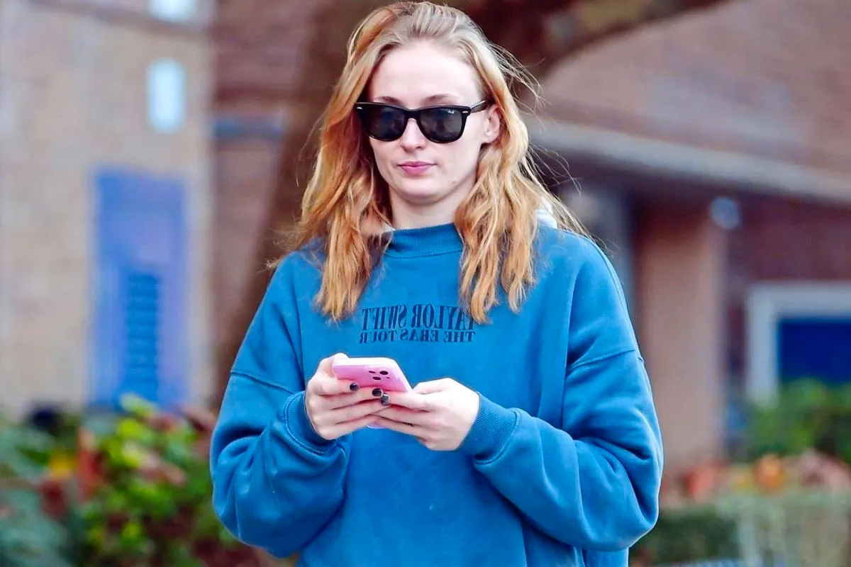 Sophie Turner Supports Friend Taylor Swift by Wearing Eras Tour Sweatshirt While Out and About in London Image