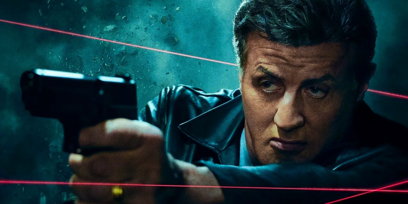 Stallone pointing a gun in a promotional image for Escape Plan 2_ Hades Image