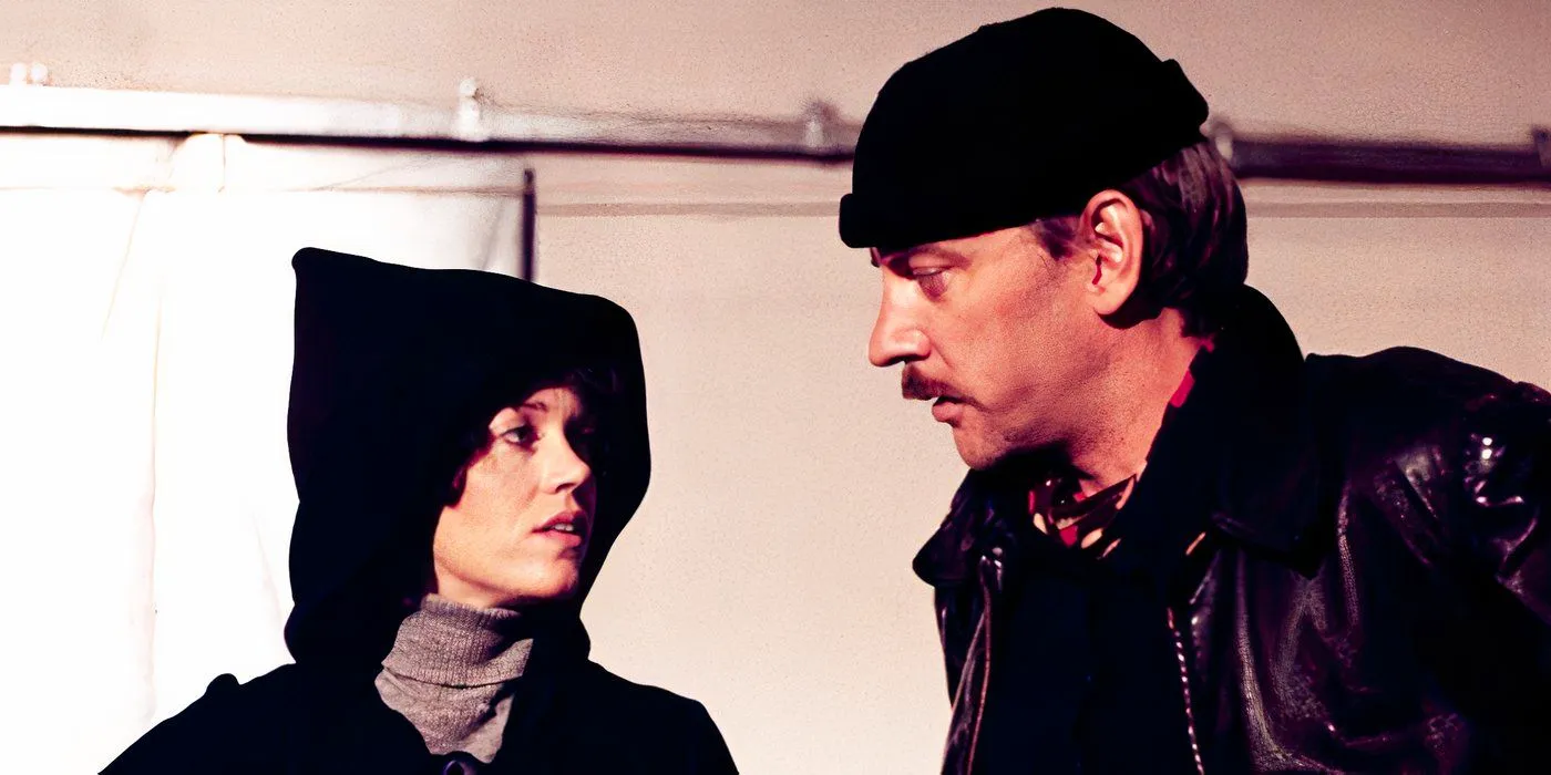 Steelyard Blues (1973) Donald Sutherland Plays Jesse Veldini talking to female co-star, Donald wearing a hat with a moustache Image