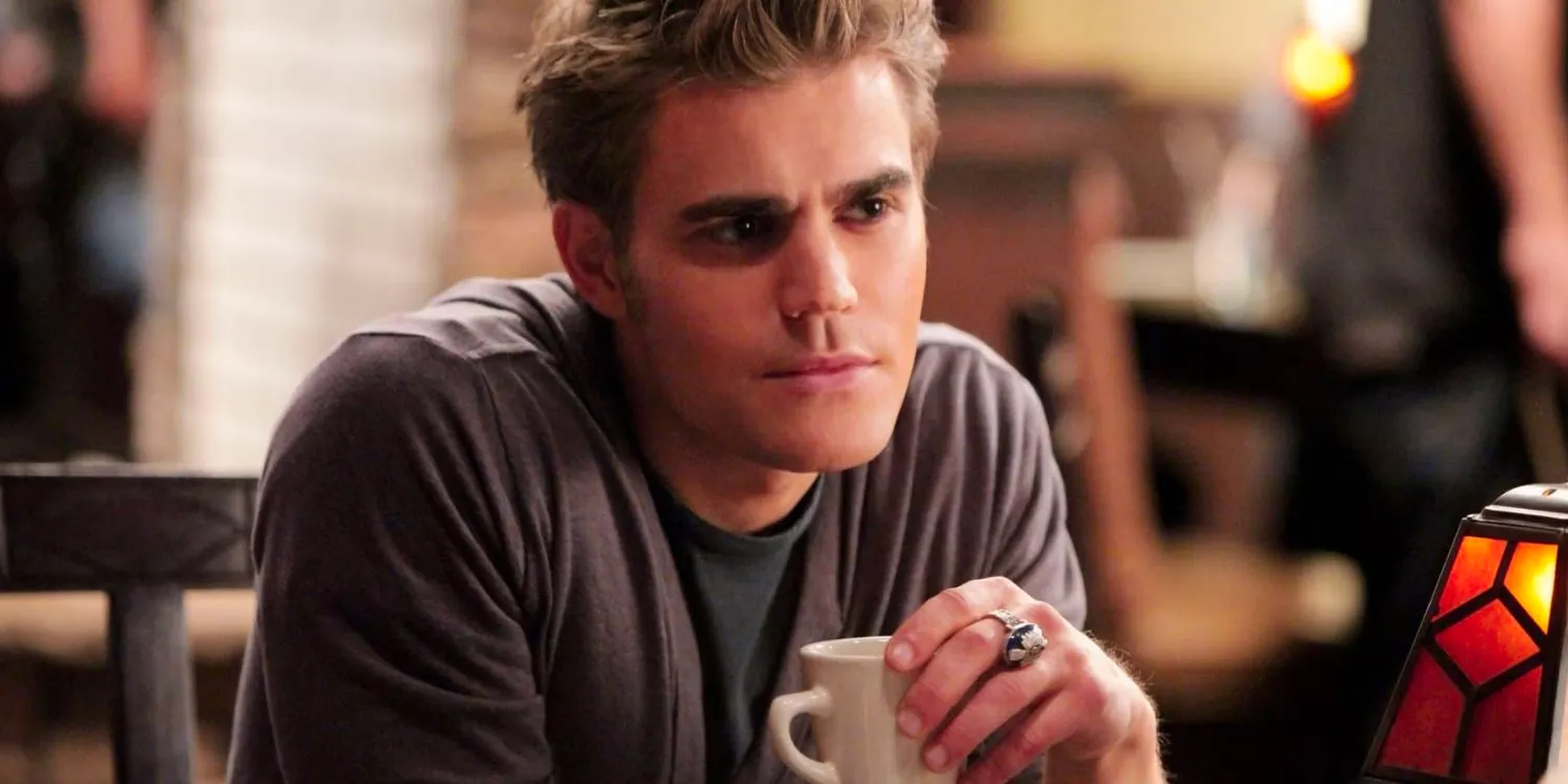 Stefan drinking coffee in The Vampire Diaries Image