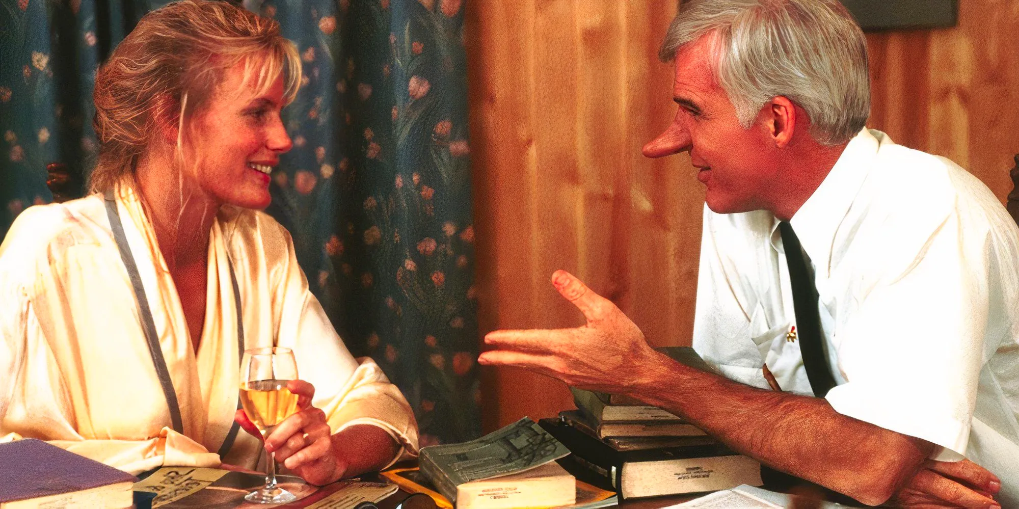 Steve Martin as Charlie Bales and Daryl Hannah as Roxanne having dinner and chatting in Roxanne. Image