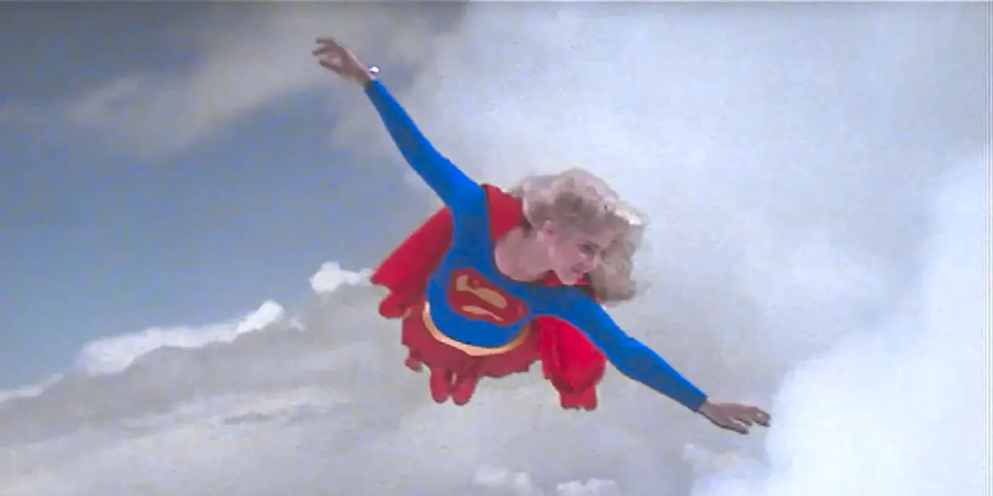 Supergirl flies in the clouds in Supergirl 1984 Image