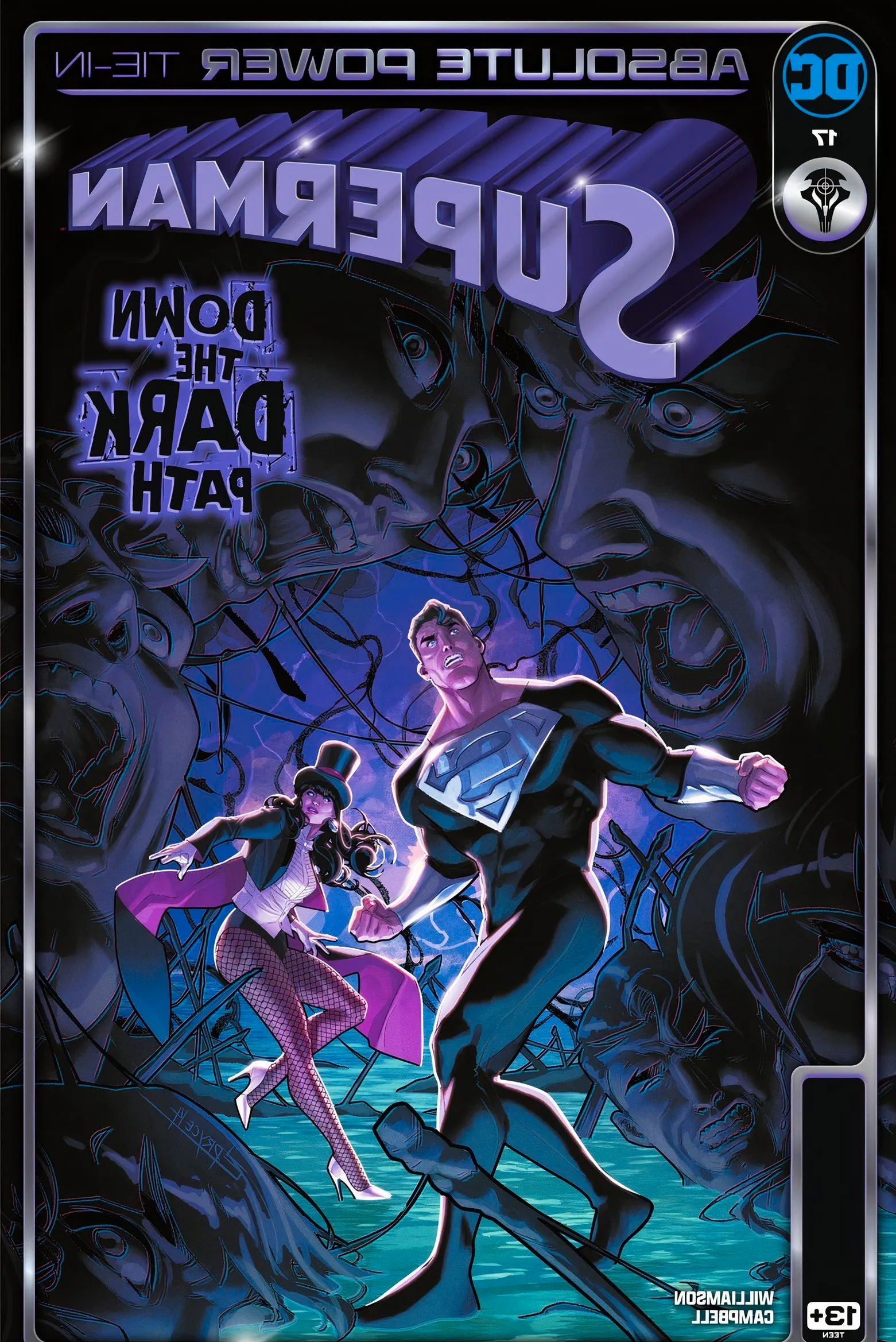 Superman #17 cover, Superman and Zatanna walk a glowing purple path, as screaming faces emerge from the darkness. Image