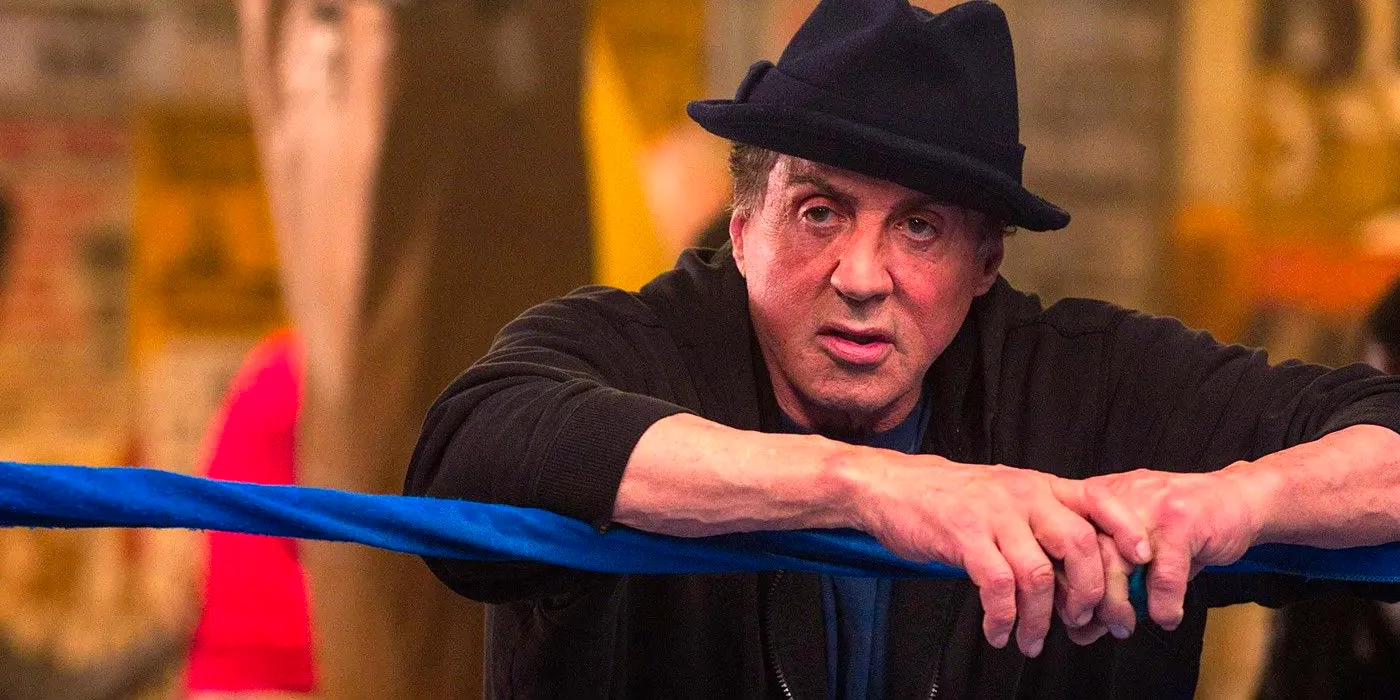 Sylvester Stallone leaning on the ropes in Creed Image