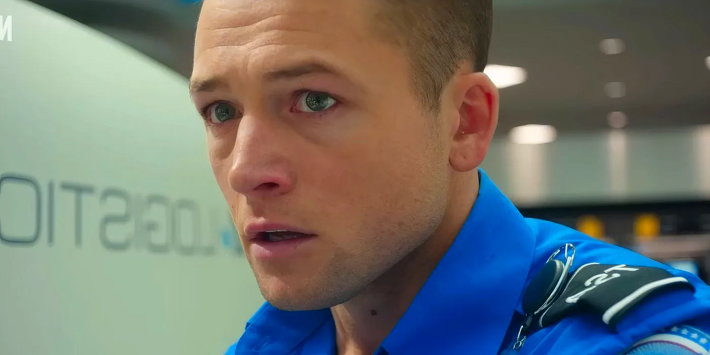 Taron Egerton looking nervous in Carry-On Image