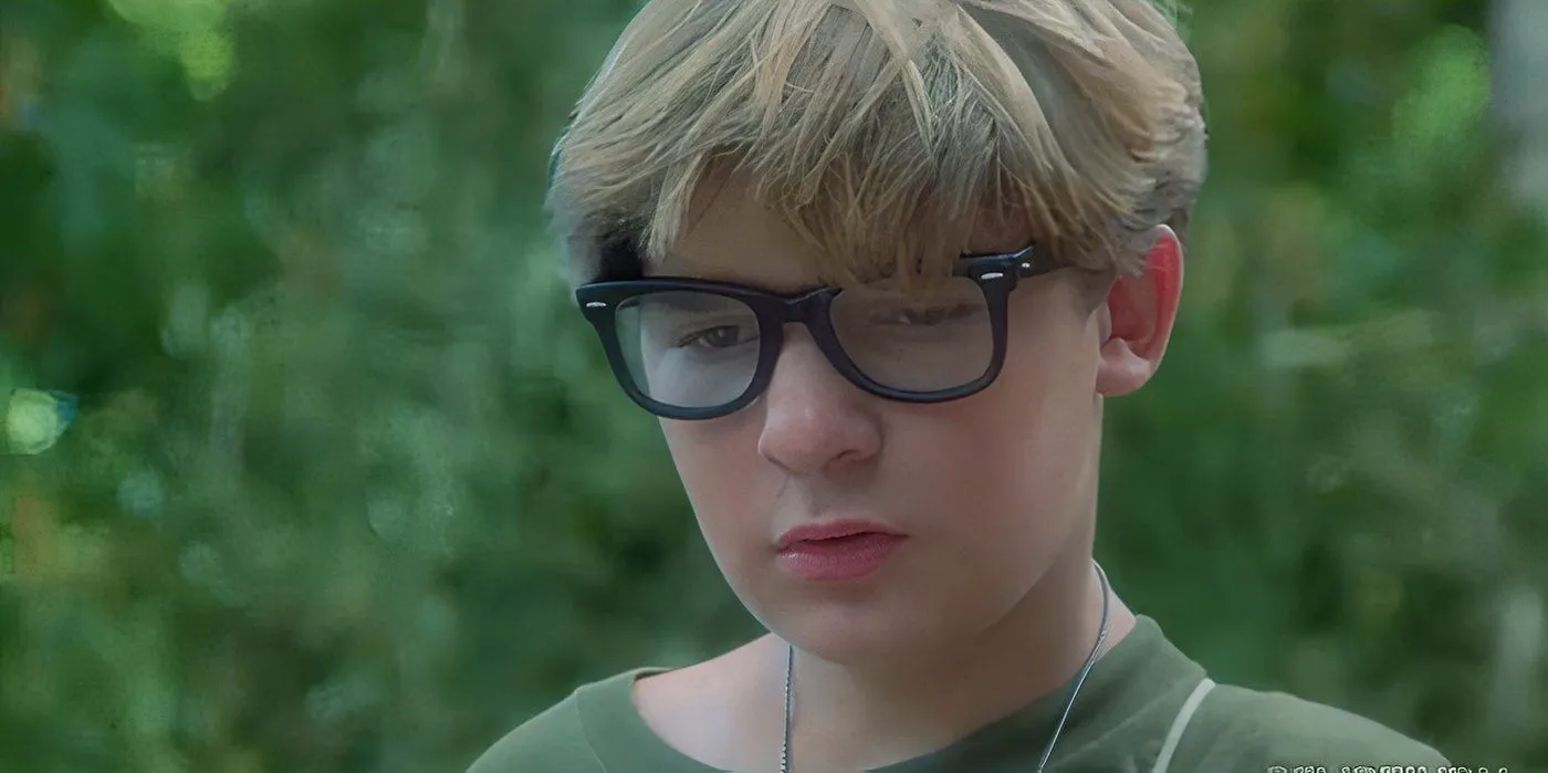 Teddy (Corey Feldman) looking down in Stand By Me Image