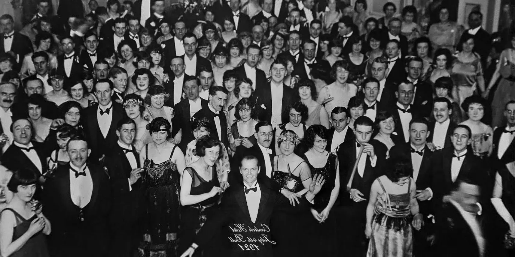 The black and white photo labeled from 1921 full of a crowd of guests that appears in The Shining ending Image