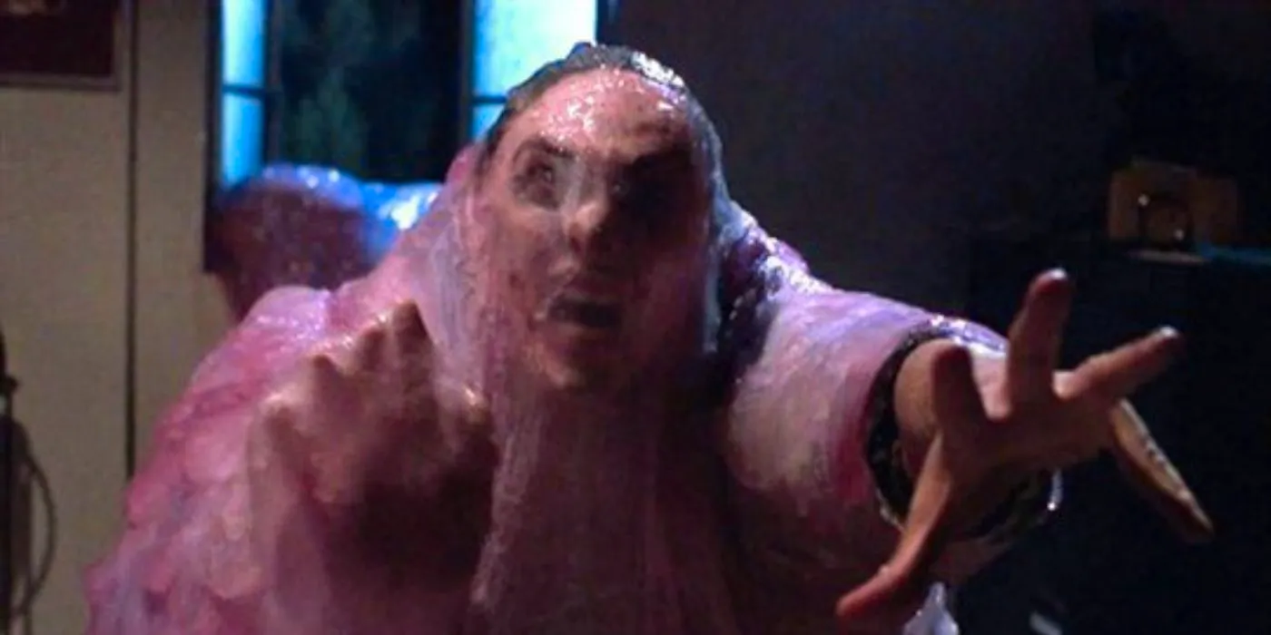 The Blob absorbing a man in the 1988 film. Image