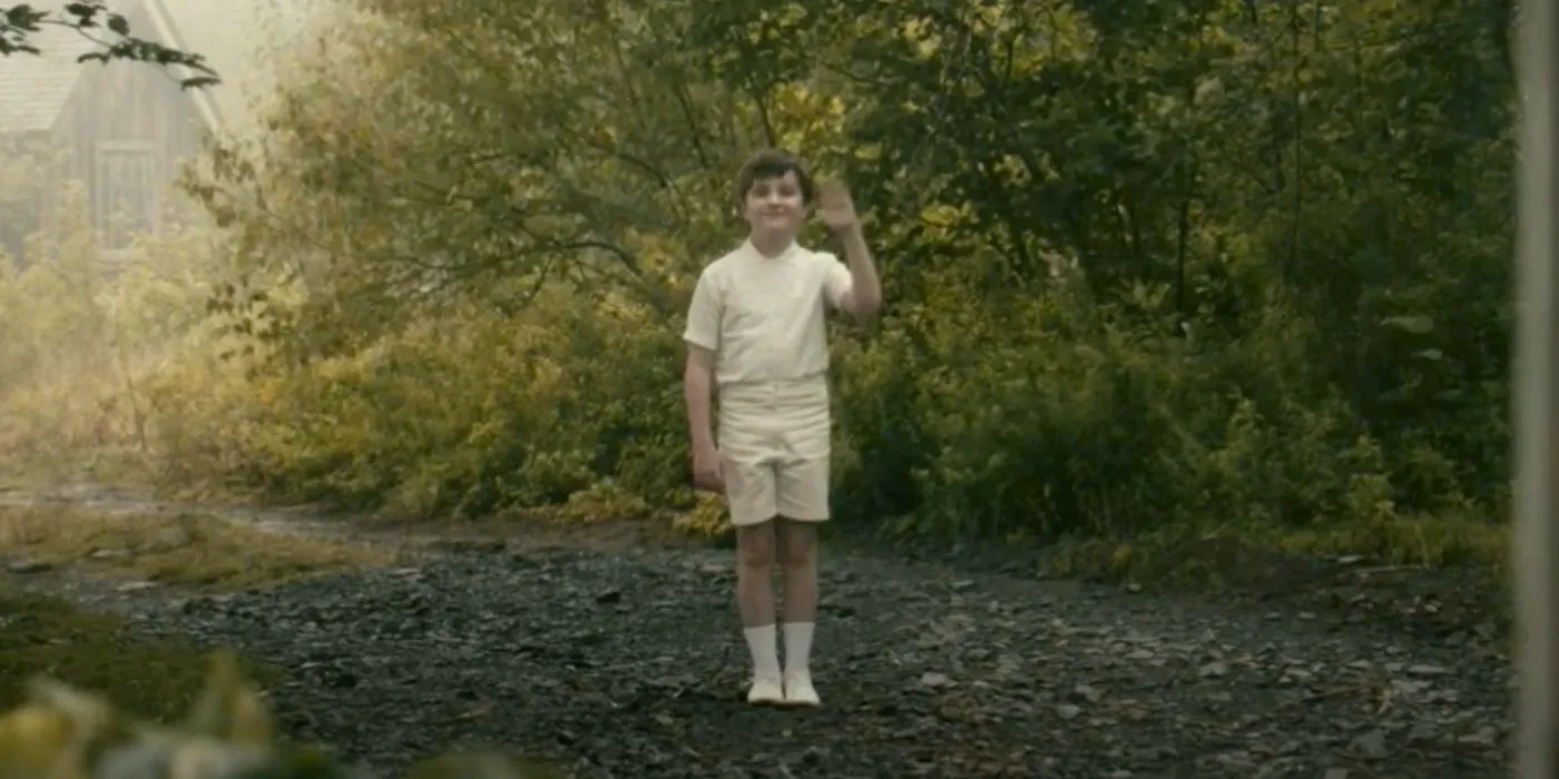 The Boy in White waving in From. Image