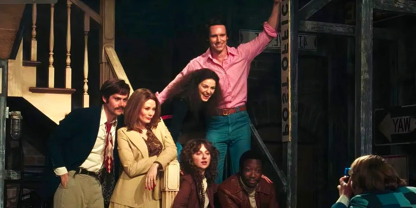 The cast of Saturday Night sitting on the set posing for a picture in Saturday Night Image