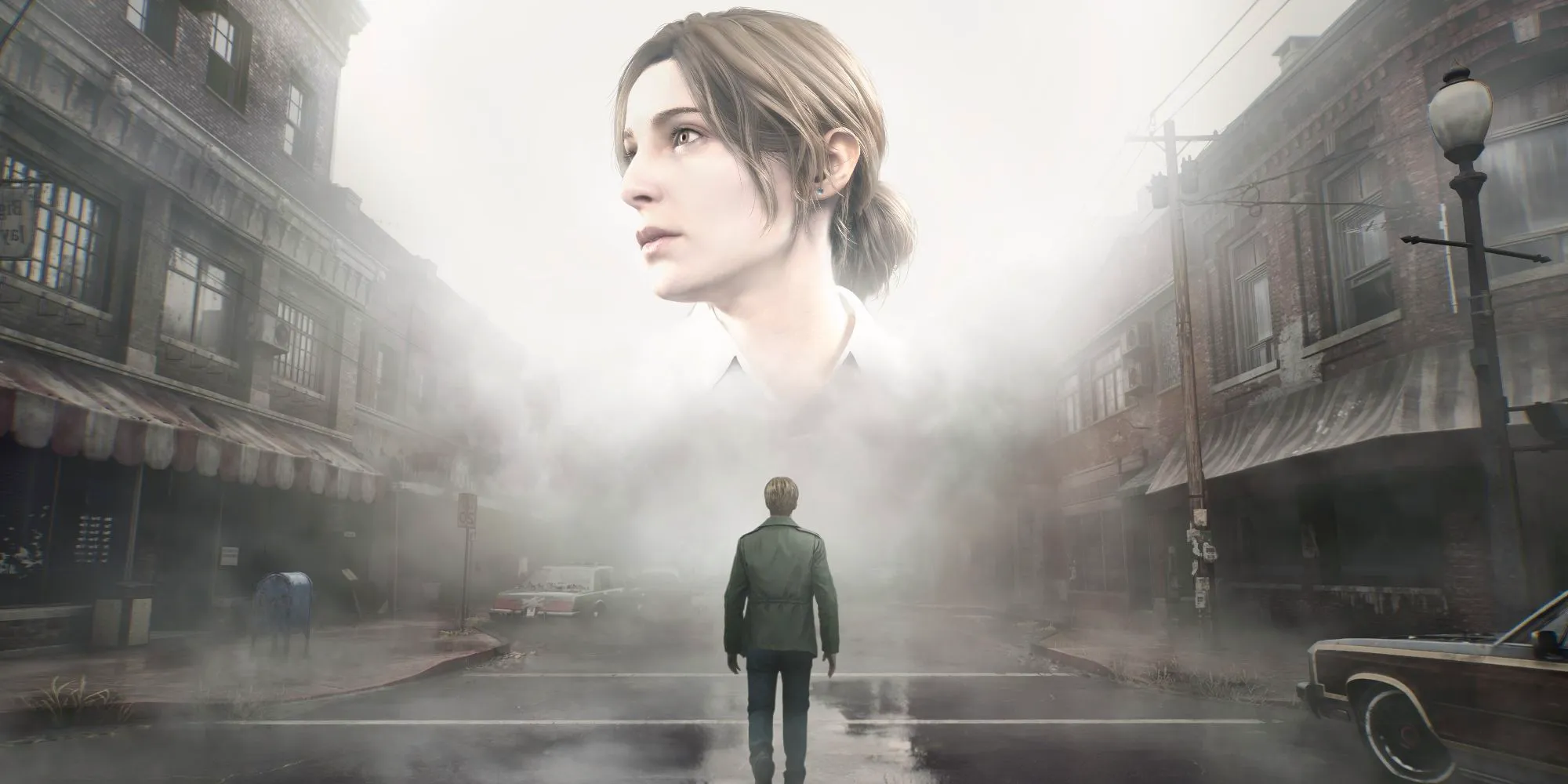 The cover art for the Silent Hill 2 remake, showing James Sunderland walking down a foggy street. An image of his wife, Mary, hangs in the air above him. Image