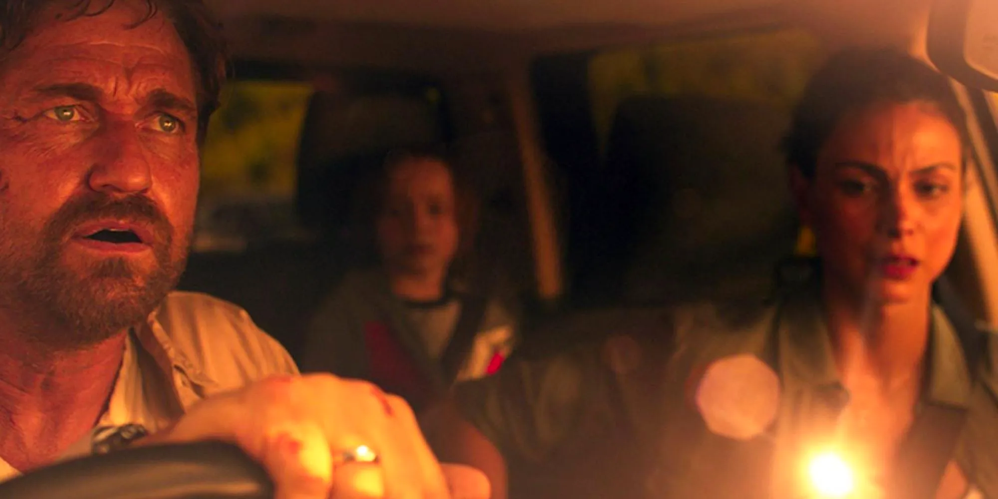 The Garrity Family look up in their car in Greenland Image