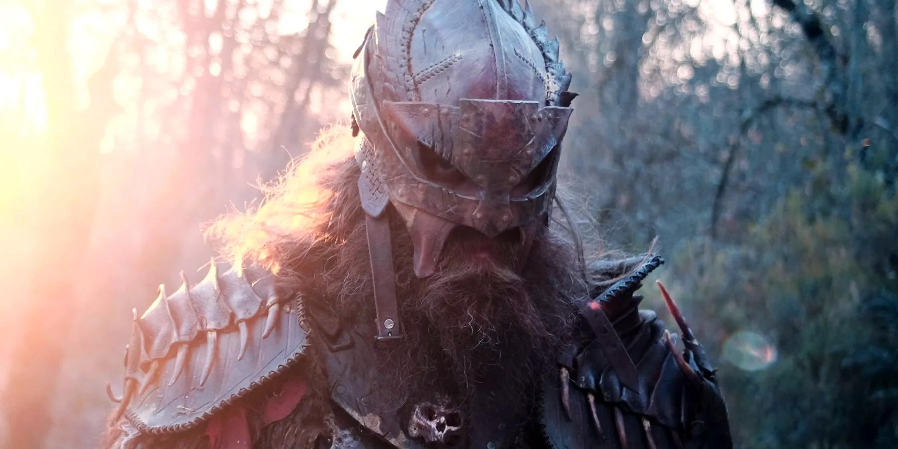 The Head Hunter Grimacing While Wearing His Helmet in the Head Hunter 2018 Image