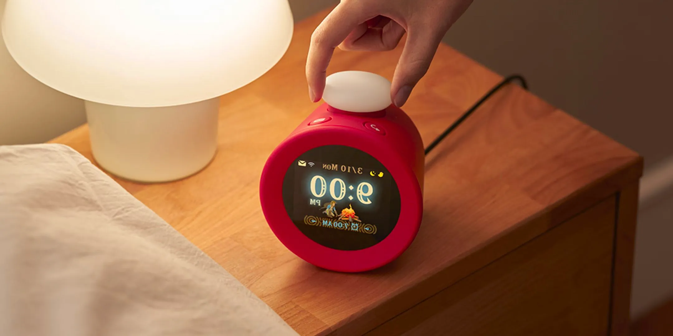 The Nintendo Sound Clock Alarmo on a bedside table. Image