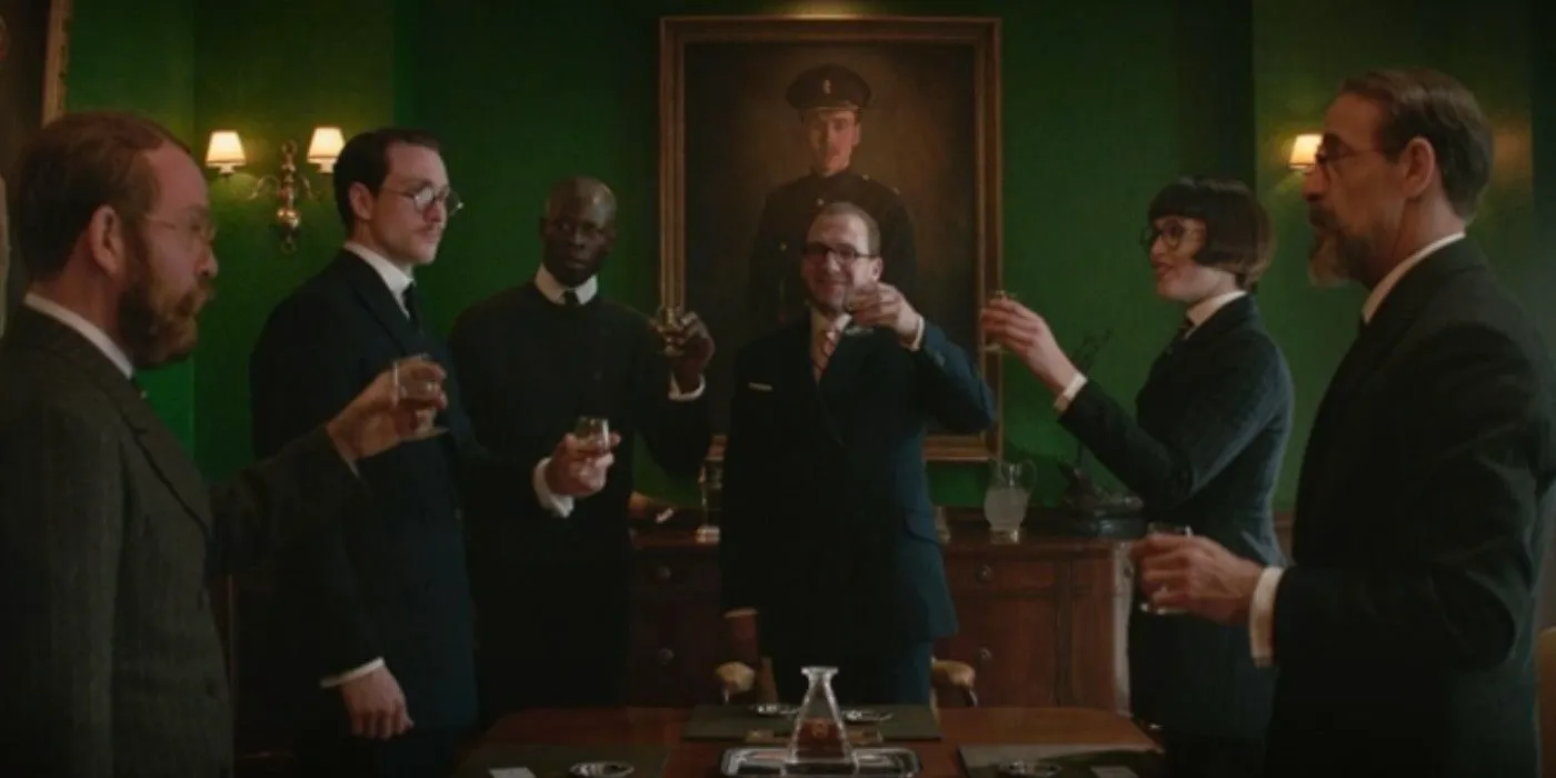 The original Kingsman agency raises a toast in a green board room in The King's Man Image