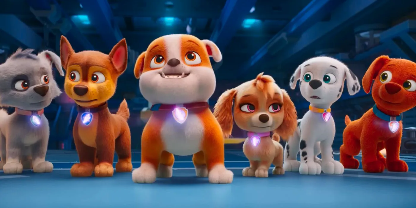 The PAW Patrol members stand together with glowing collars in Paw Patrol Mighty Movie. Image