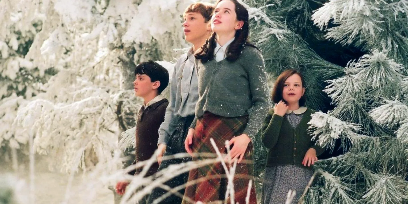 The Pevensie children look on in awe as they see Narnia in The Lion, the Witch and the Wardrobe Image